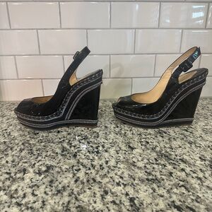 Size 9m Christian Louboutin platform wedge shoes.